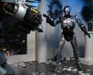 RoboCop Figura Ultimate Battle Damaged RoboCop with Chair
